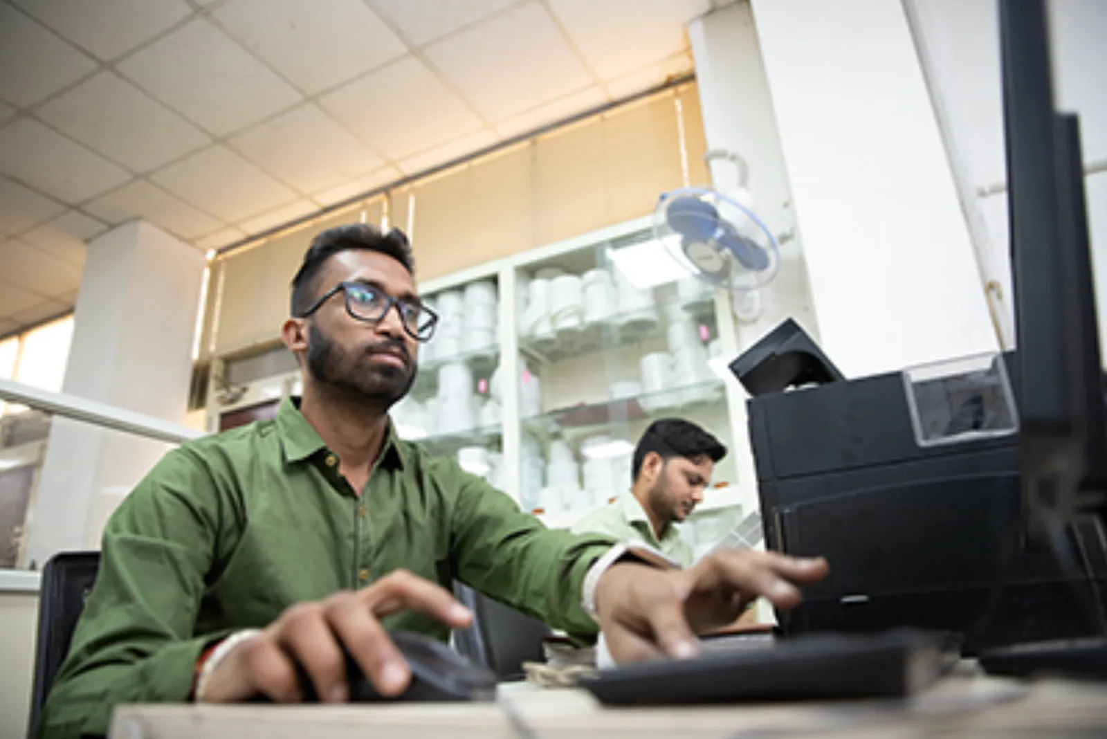 An engineer working on a design at a computer