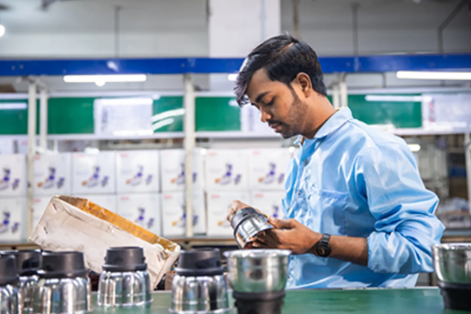 A technician inspecting a product prototype